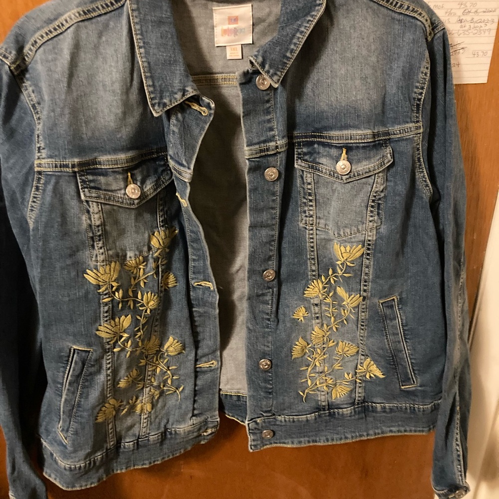 NWT. Lularoe Harvey jean jacket with yellow flowers.